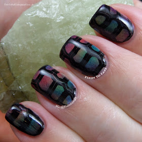Rainbow tortoise print nail art.