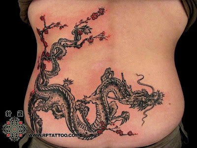 DownloadThis Chinese dragon free tattoo design is mixed with a tree