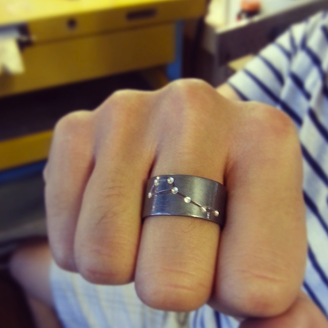 Silver boyfriend ring.