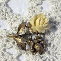 Bone rose brooch by Exquisite