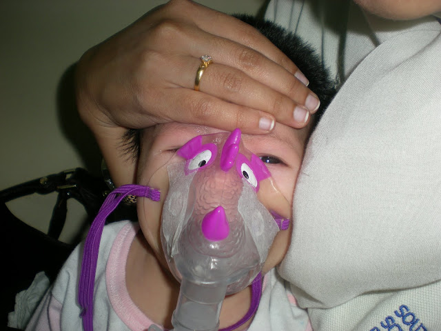 Adel on her first nebulizer  Mrs. Simplicity