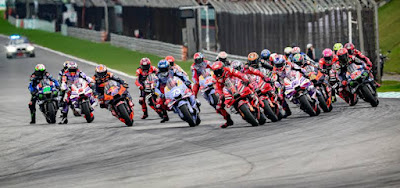Why do racers dangle their leg? MotoGP
