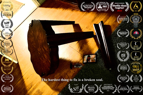 Version 2 of THE BROKEN TABLE's poster with all of its film festival laurels.