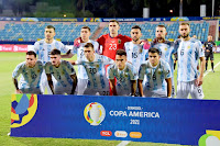 SELECCIÓN DE ARGENTINA. Temporada 2020-21. Leandro Paredes, Nahuel Molina Lucero, Emiliano Martínez, Nicolás González, Nicolás Otamendi, Germán Pezzela. Lionel Messi, Rodrigo De Paul, Giovanni Lo Celso, Lautaro Martínez, Marcos Acuña. SELECCIÓN DE ARGENTINA 3 SELECCIÓN DE ECUADOR 0. 03/07/2021. XLVII edición de la Copa América Brasil 2021, cuartos de final. Goiania, Brasil, estadio Olímpico Pedro Ludovico Teixeira. GOLES: 1-0: 39’, De Paul. 2-0: 83’, Lautaro Martínez. 3-0: 90+2’, Leo Messi.