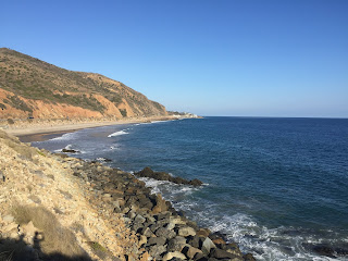 This photo was taken in California along the PCH between Vandenburg Air Force base and Pismo Beach. This was my first and only time visiting my sister while she was based in VAF. This was a magical drive, I just remember hanging my head and right arm out the window and smiling. 