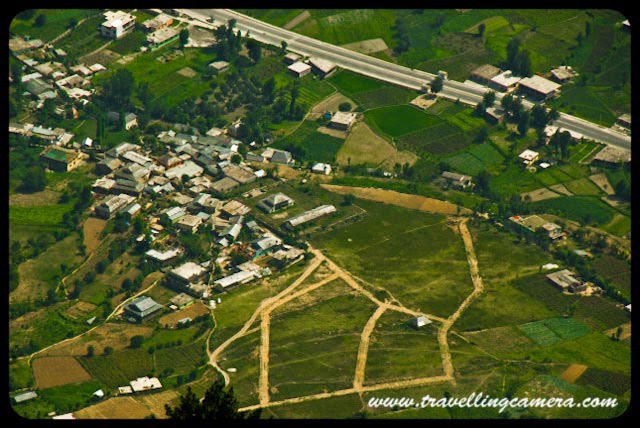 Wonderful trekking experience of Bijli Mahadev @ Kullu-Manali, Himachal Pradesh : Posted by VJ Sharma at www.travellingcamera.com :Last year when I went to Kullu Manali with my college friend, Bijli-Mahadev is the place I liked the most. Its a wonderful place on hill top from where whole Kullu Valley, Manikaran, Malana, Bhuntar and bunch of Apple Orchids can be seen... Here are few views of Bijli Mahadev...Here is the very first view on reaching Bijli Mahadev... You are seeing a yellow path on right side of the photograph, which is a road connected through some small villages and apple orchids... It connects this Bijli Mahadev with Naggar... This road is not recommended if there are rains or probability of rains...Here is the road I was talking about... It a nice walk from Bijli Mahadev...but don't go far..A view to hills in parallel with clouds...Photograph clicked while coming back towards Bijli Mahadev from that road which connects it with Naggar...Few local people sitting on an edge of Bijli Mahadev which is giving a view of Malana Village and Kasol region...Other side of Bijli Mahadev which has dense forest of Deodars on a steep hill...Friends walking around Bijli Mahadev and enjoying the chilly/fast winds here...Radio Transmission Anteena near Bijli Mahadev Temple...A view of Beas River and Bhuntar Airport from Bijli Mahadev...Closer view to Bhuntar airport from Bijli Mahadev @ Kullu, Himachal Pradesh, INDIA...A closer look to Manali Highway and green fields around it... This has been shot from a an edge of Bijli Mahadev...Closer view to Beas River from Bijli Mahadev @ Kullu, Himachal Pradesh, INDIA...Another shot of Kullu Valley from Bijli Mahadev... Here we can see Beas river flowing on one side of Bhuntar airport...Eagle flying on top of Kullu but still at lower heights as compared to Bijli Mahadev...See this man standing on the edge @ Bijli Mahacdev, Kullu, Himachal Pradesh... Its very surprising to see these cattles having their food with very easy walk on these steep hills...It was lovely experience under clouds with cool winds and having amazing views on three sides... Views to Kullu Twon, valley, Apple Orchids, Bhuntar Airport, Beas river, Malana, Manikaran and Kasol Region...