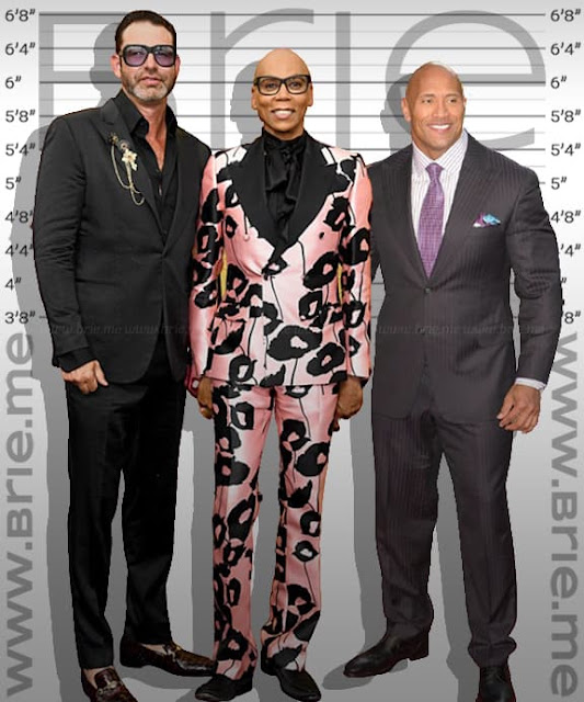 RuPaul standing with George LeBar and The Rock