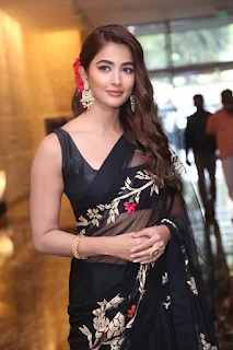 Pooja Hegde Saree Stills at Acharya Movie Press Meet