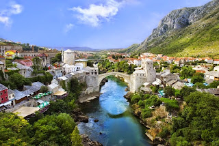 Old bridge is a reconstruction of a 16th century Ottoman bridge in the city of Mostar in Bosnia and Herzegovina that crosses the river Neretva and connects two parts of the city. The Old Bridge stood for 427 years, until it was destroyed on 9 November 1993 by Croat forces during the Croat Bosniak War. Subsequently, a project was set in motion to reconstruct it, and the rebuilt bridge opened on 23 July 2004. Old bridge over the Neretva River, Mostar, Bosnia and Herzegovina