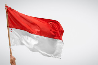 ilustrasi gambar bendera merah putih dari kompas.com untuk artikel "Dulu Kita Dijajah Belanda, Sekarang Dijajah Corona" oleh pical gadi di picalg.blogspot.com