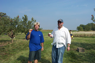 sunny boy and big mike apple picking at elegant farmer