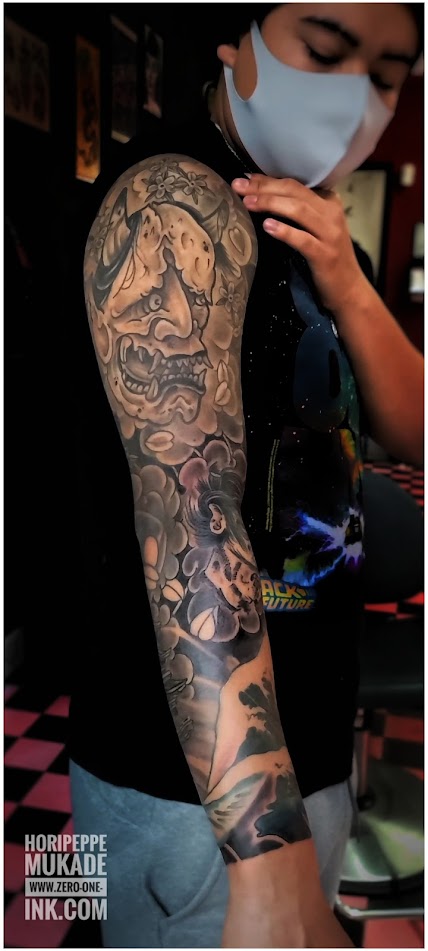 Japanese Hynnya mask full sleeve tattoo in black and grey style done by tebori at zero one ink tattoo Sacramento CA