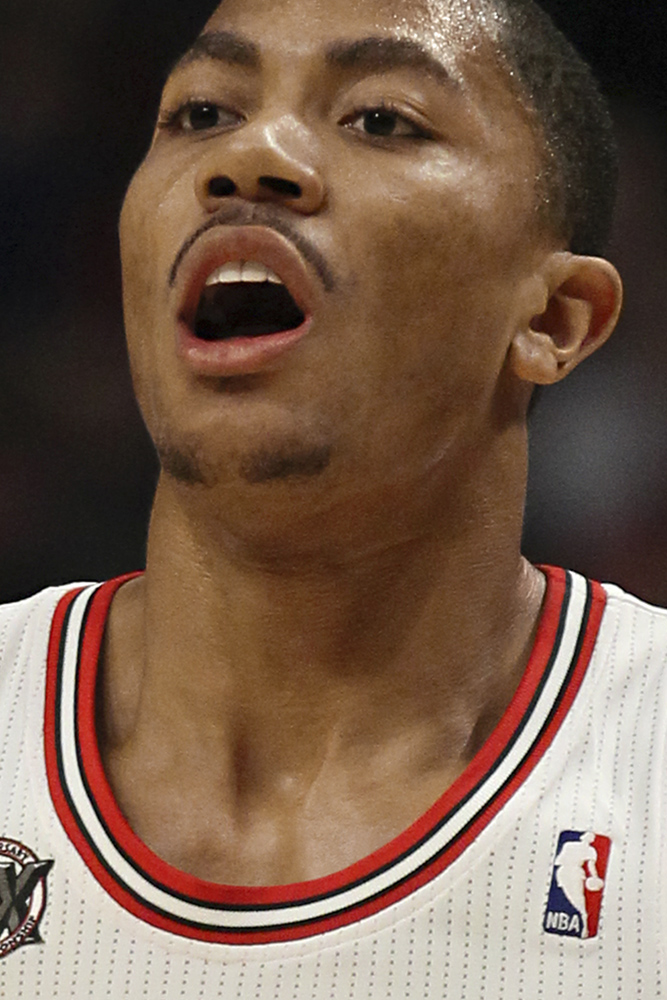 pictures of derrick rose tattoos. derrick rose tattoos on his