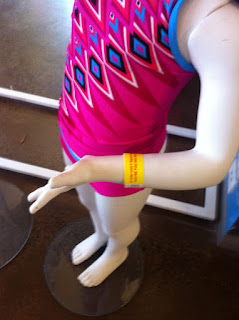 Picture of a manikin wearing a bathing suit and a wristband for Toddler Drowning Prevention