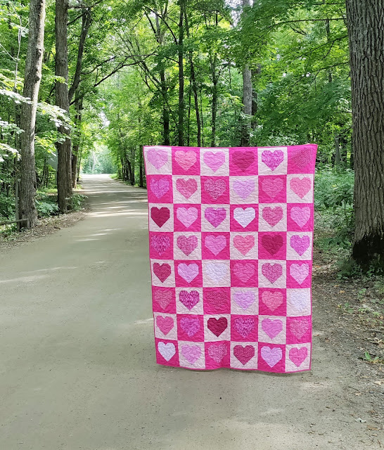 Pink heart quilt made with fabrics all from JOANN