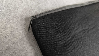 A closer look at the cushion and the zip