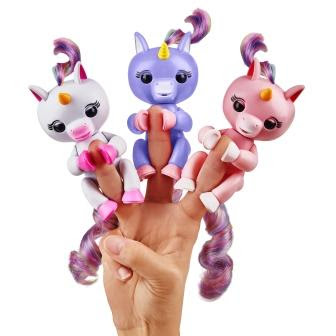 3 Fingerlings Baby Unicorn on one hand