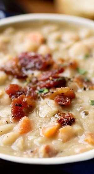 A comforting creamy white bean soup with smoky thick-cut bacon, tender vegetables and fragrant herbs—it’s warming coziness in a bowl.