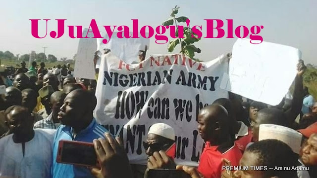 Breaking News: Protesters Block Abuja Highway, Accuse Govt of Excessive Ceding of Land to Army