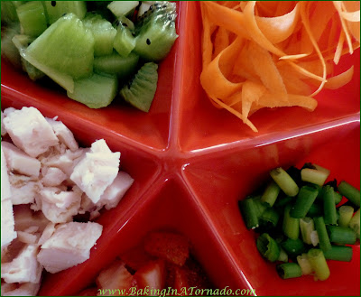 Fruited Chicken Lettuce Wraps, chicken, fresh fruits and veggies in a light sauce rolled into lettuce leaves | Recipe developed by www.BakingInATornado.com | #recipe #salad