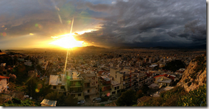The sun sets over Athens - photo by ihasb33r