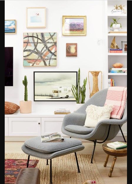 Simple couch design for a tiny space with custom painting combine book shelves at small space decor ideas