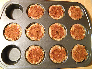 Dozen Muffin Tin Filled with 10 Muffins Before Baking