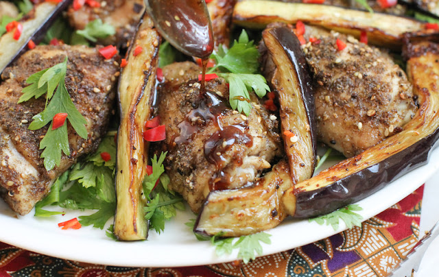 Food Lust People Love: Not your typical salad, this lovely roast za’atar chicken and eggplant salad combines fresh herbs with succulent chicken thighs and golden fried eggplant, drizzled with a tangy pomegranate molasses dressing.