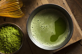 Pic of Japanese frothy Japanese green tea, matcha tea powder and tea whisk