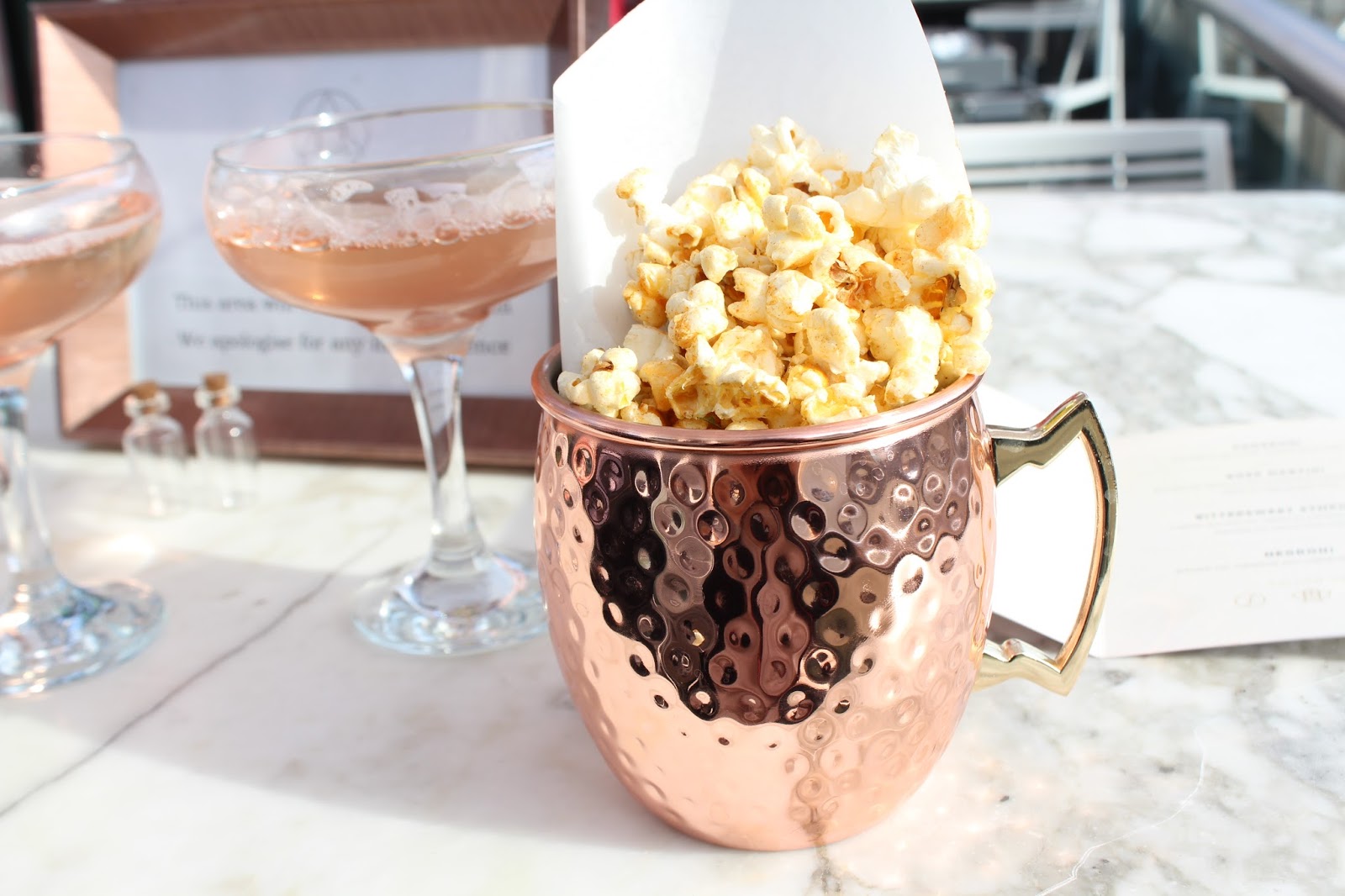 Popcorn and cocktails at The Alchemist Trinity Leeds cocktail terrace