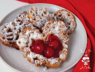 http://birdonacake.blogspot.com/2012/01/mini-funnel-cake-hearts.html