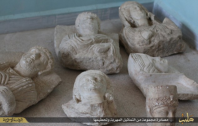 ISIS smashes priceless Palmyra artefacts