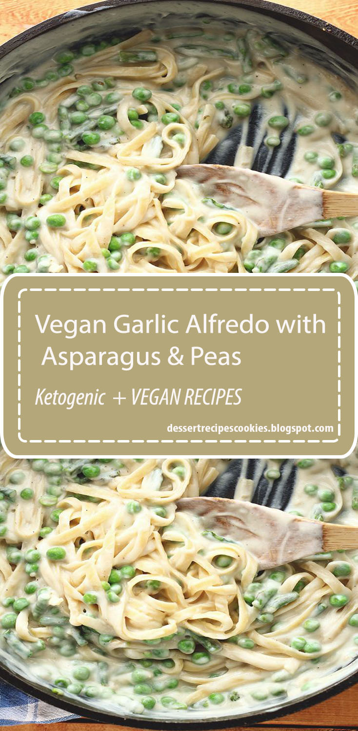 A creamy vegan garlicky fettuccine Alfredo complete with peas and asparagus. Makes 4-5 servings.