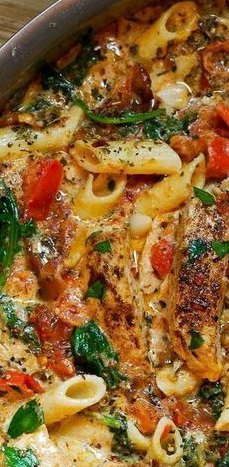 This chicken pasta with spinach and bacon in creamy tomato sauce is simply amazing with Parmesan cheese! T
