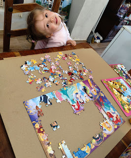 Rosie working on her princesses jigsaw