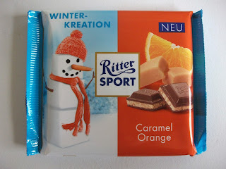 Christmas editition of Ritter Sport containing a caramel and orange flavour cream filling