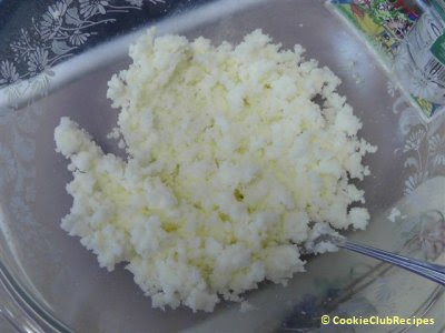 butter and sugar mixed together in bowl