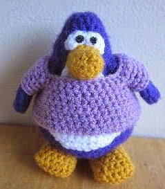 http://www.craftsy.com/pattern/crocheting/toy/club-penguin-tank-top-and-shirt/90649