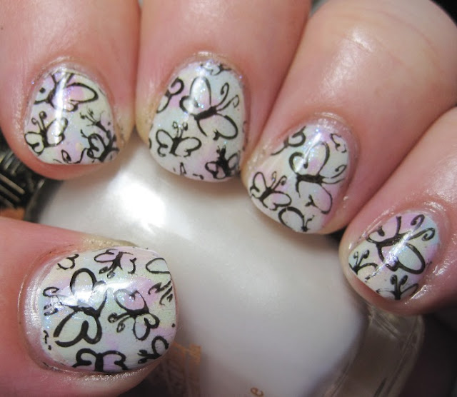 Abstract brushstroke with L'Oreal pastels and butterfly stamp