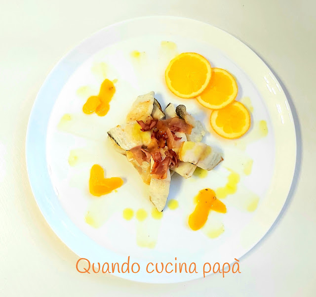 Orata con salsa d'arance e petali di crudo di Parma