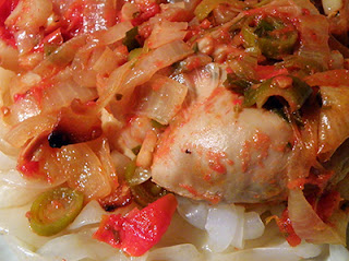 Closeup of Chicken with Green Garlic, Onion, and Tomato