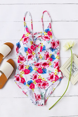 http://fr.shein.com/Floral-Print-Criss-Cross-Front-One-Piece-Swimwear-p-347701-cat-1866.html