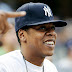 JayZ in his trademark NY Yankees cap