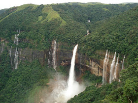 North east India - ridge, waterfall and dense green foliage