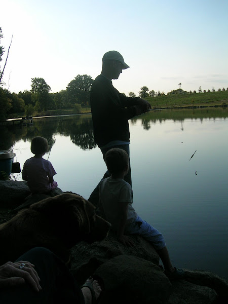 Rob showing the kids how to get the bait in the water