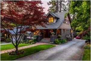 Beautiful wooden house near green trees