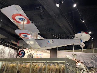 WWI era airplane hanging from the ceiling at the National World War I Museum