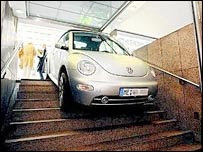 German Woman Drives Down Subway Stairs