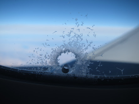 Hole in aircraft window- Breather Hole