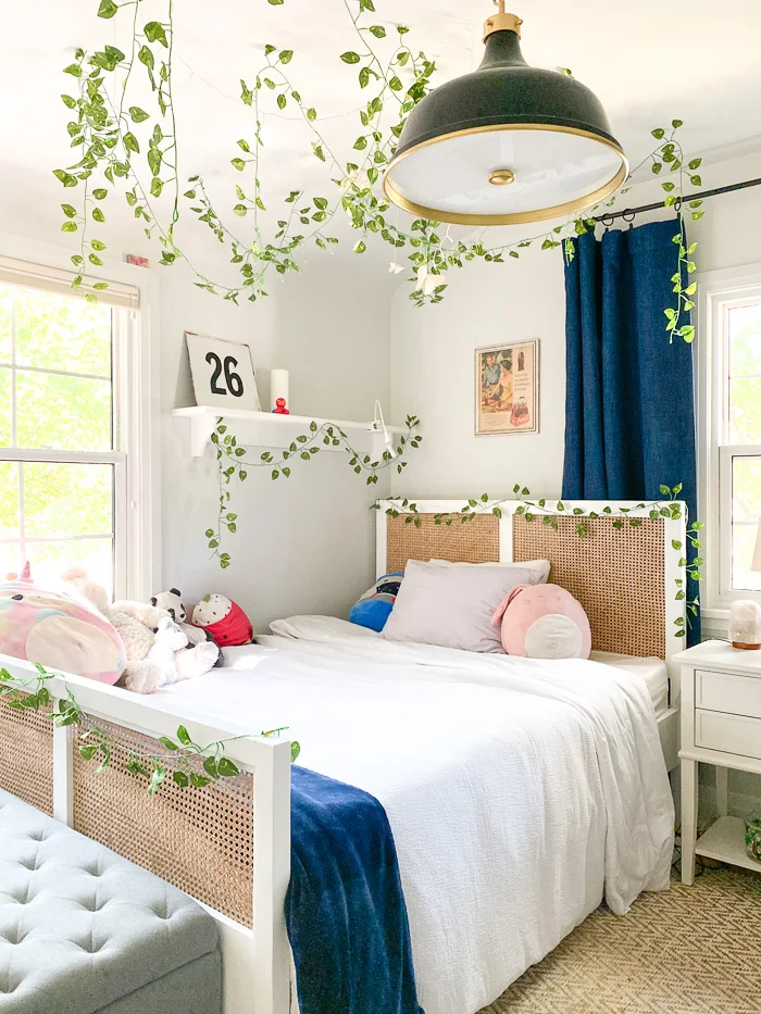 teenage girl bedroom with hanging vines and double bed